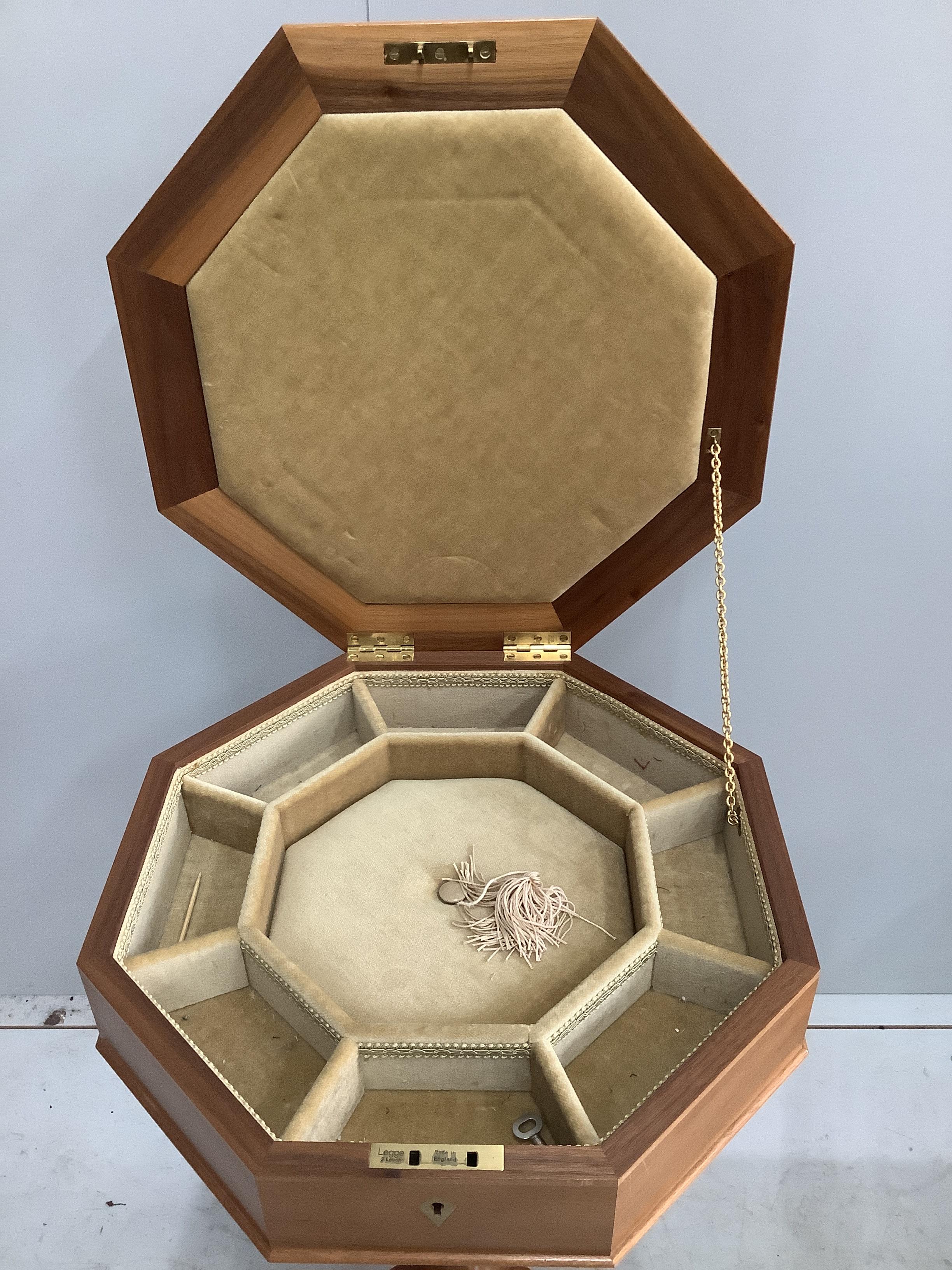 A reproduction Victorian style octagonal trumpet work table, width 42cm, height 74cm